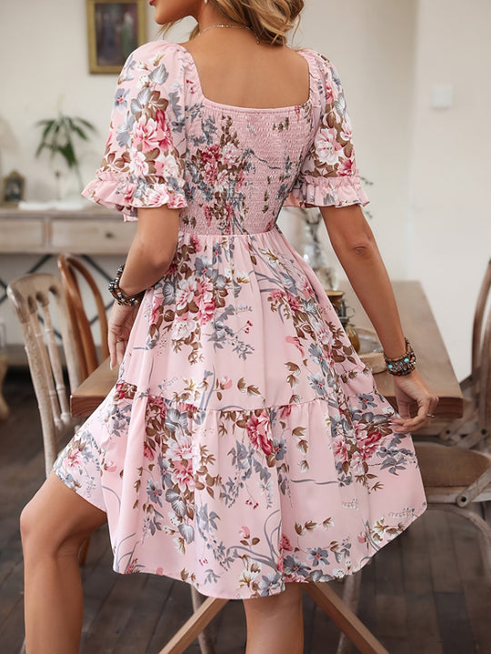 Elegant dress with gathered waist and floral print