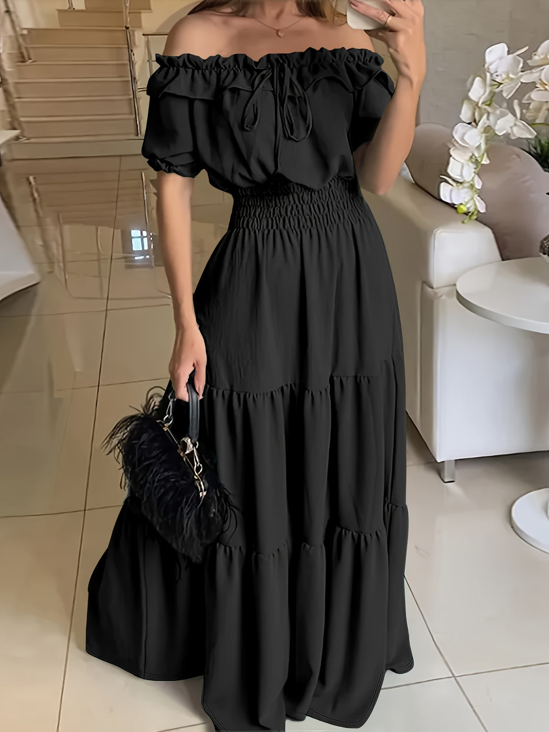 Elegant off-the-shoulder maxi dress with ruffle trim