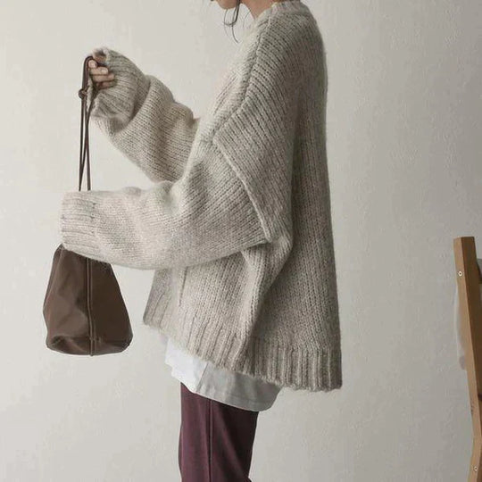 Strickpullover für Frauen mit einer Tasche