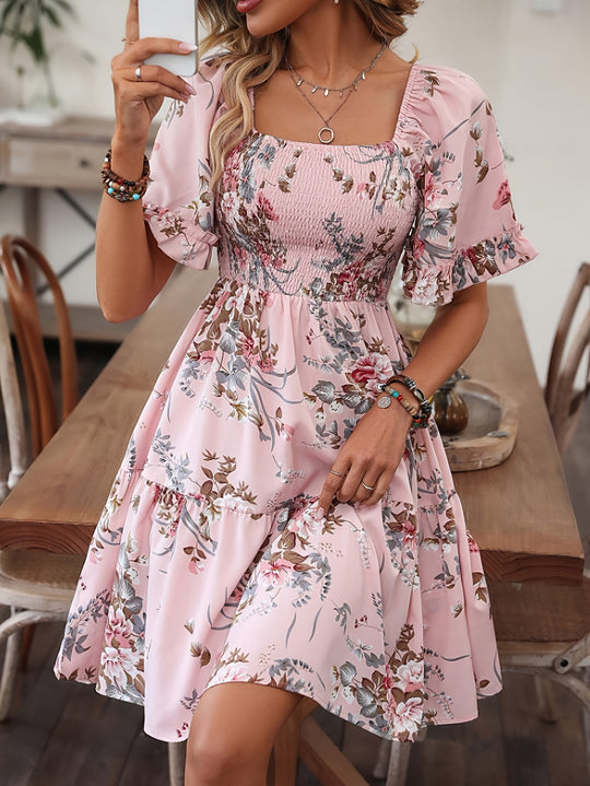 Elegant dress with gathered waist and floral print