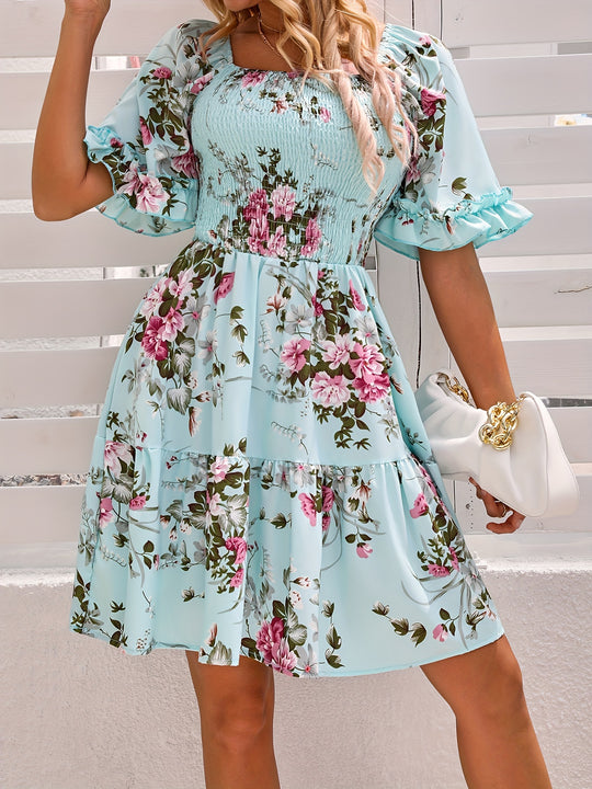 Elegant dress with gathered waist and floral print