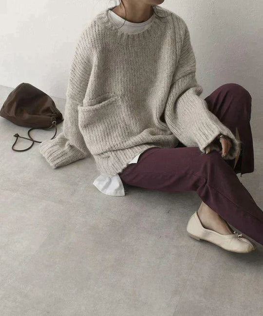 Strickpullover für Frauen mit einer Tasche