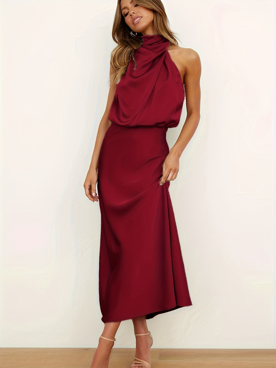 Elegant halter neck dress with cinch waist