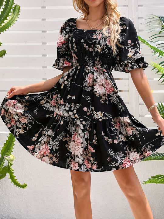 Elegant dress with gathered waist and floral print