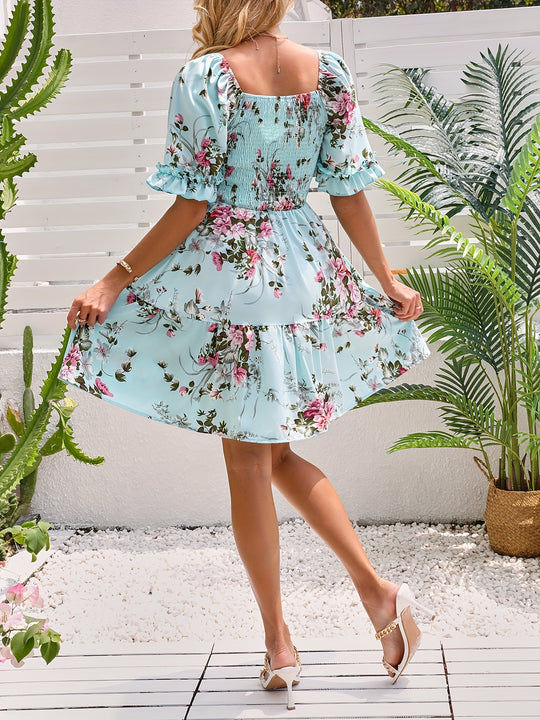 Elegant dress with gathered waist and floral print