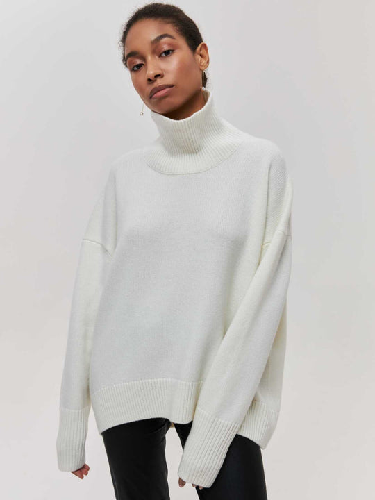 loose-fitting turtleneck sweater