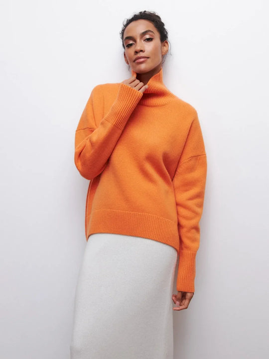 loose-fitting turtleneck sweater