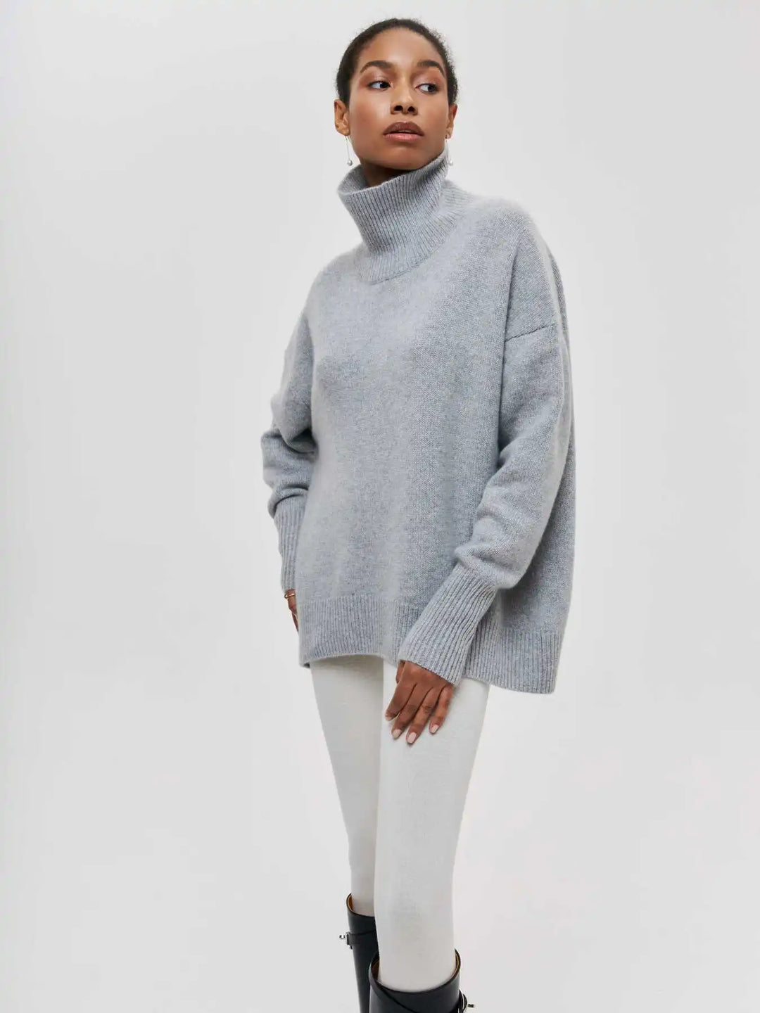 loose-fitting turtleneck sweater