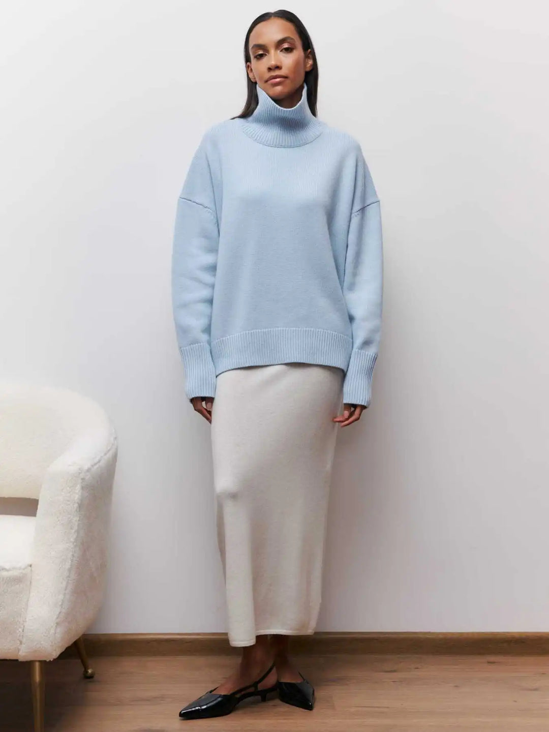 loose-fitting turtleneck sweater