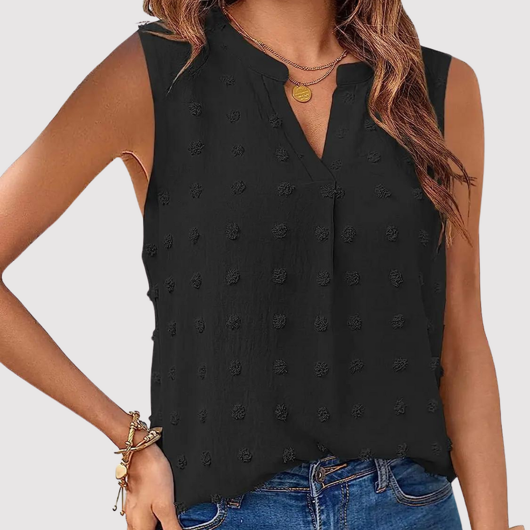 Women's sleeveless blouse with eyelets