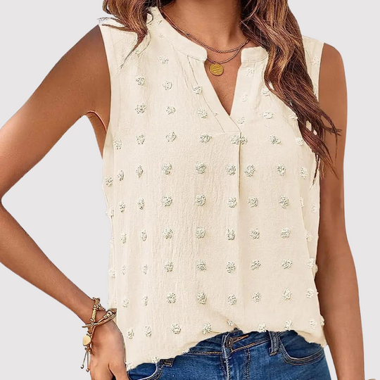 Women's sleeveless blouse with eyelets