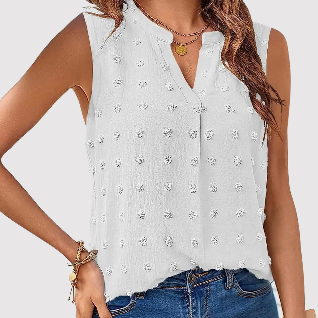 Women's sleeveless blouse with eyelets