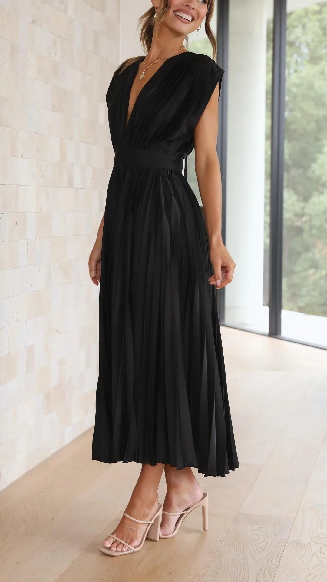 dress with deep V-neck and back strap