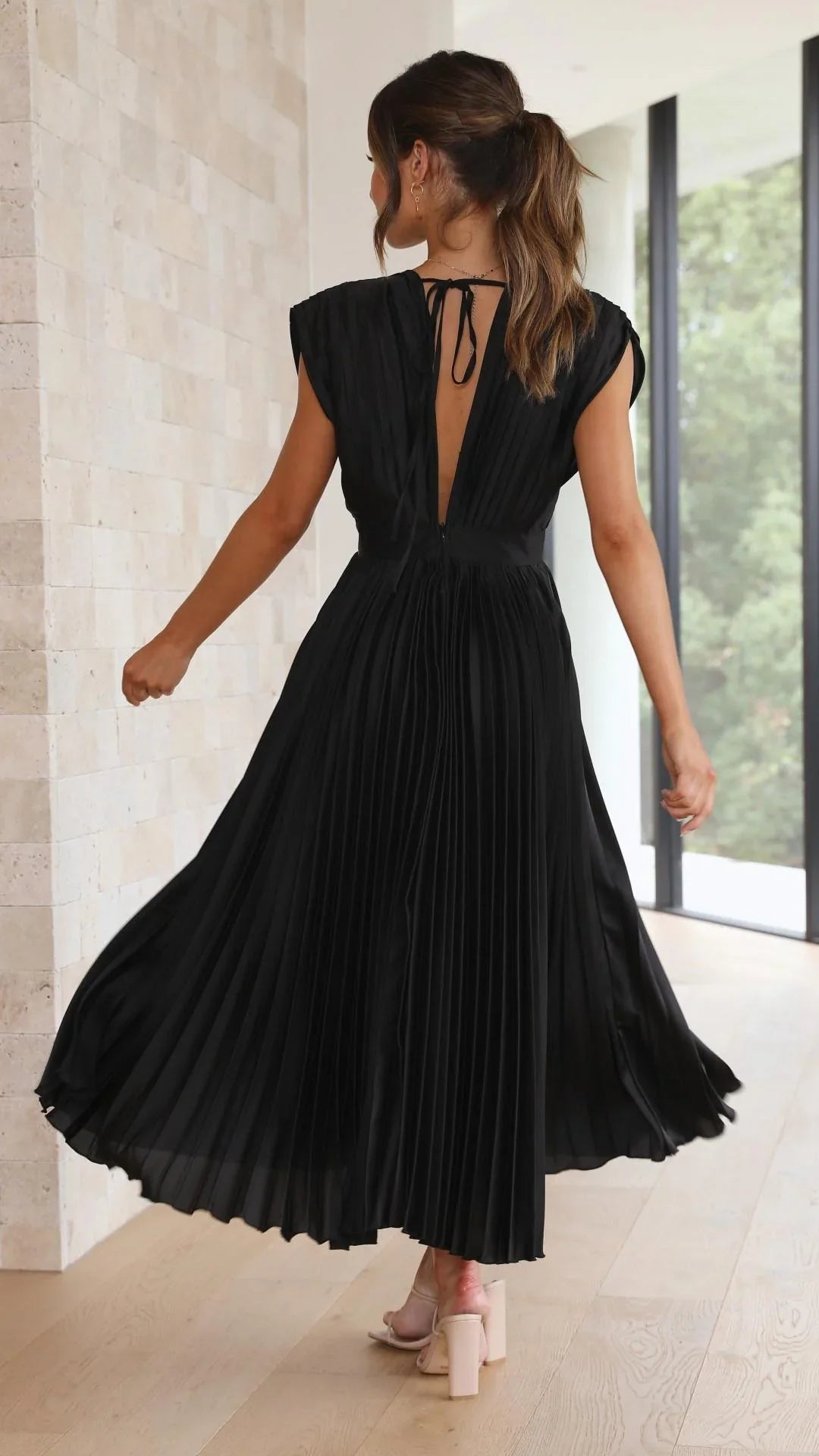 dress with deep V-neck and back strap