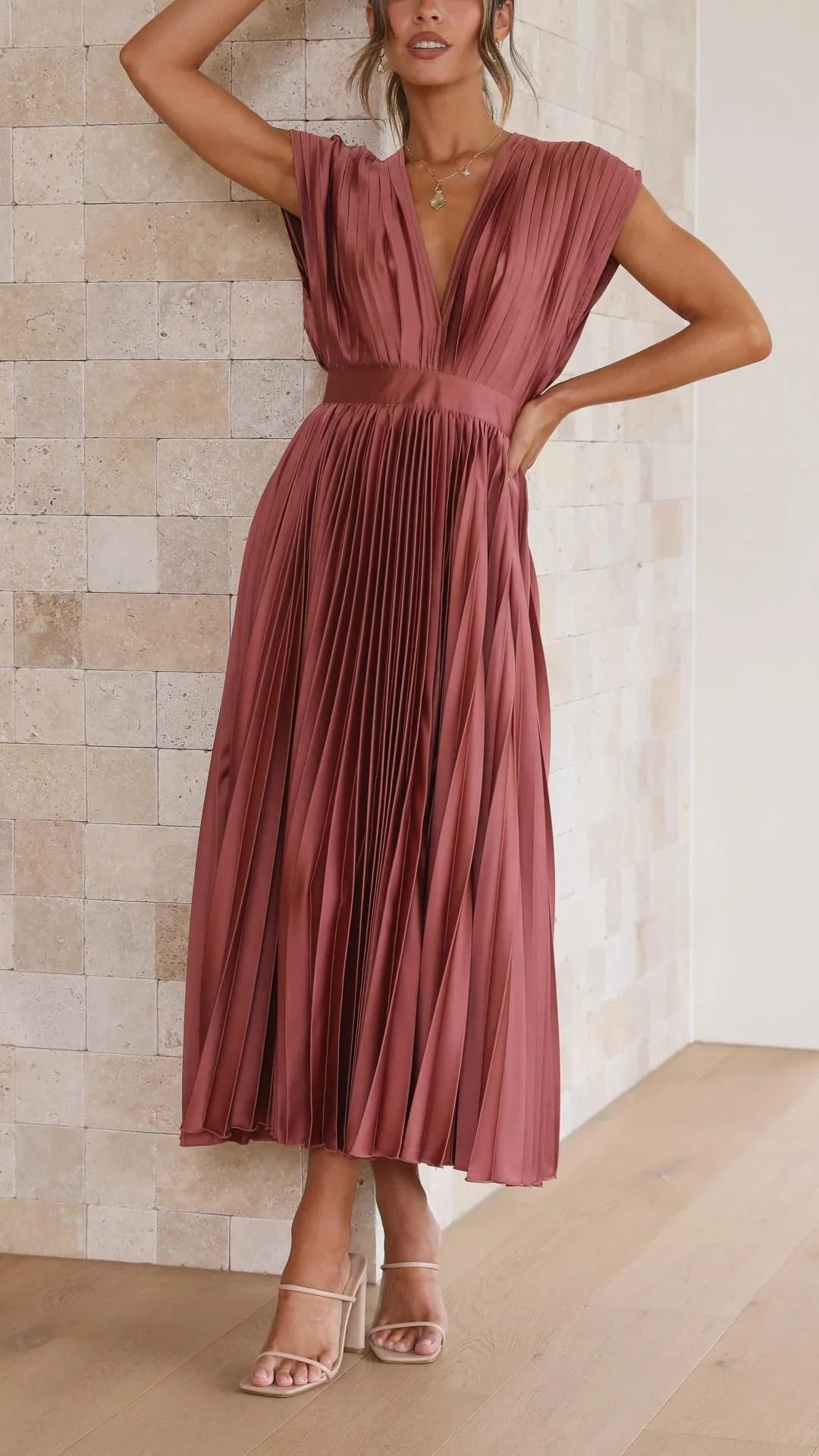 dress with deep V-neck and back strap