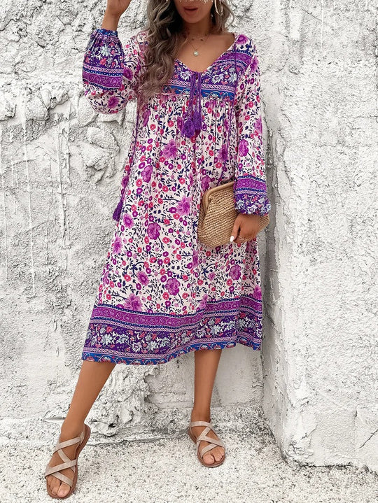 dress with floral pattern and tassels