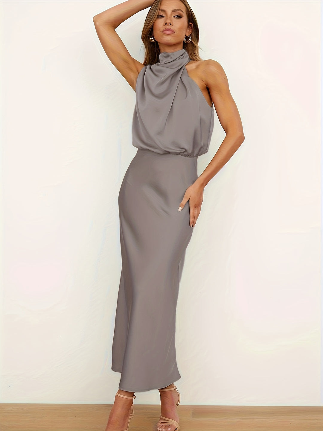 Elegant halter neck dress with cinch waist