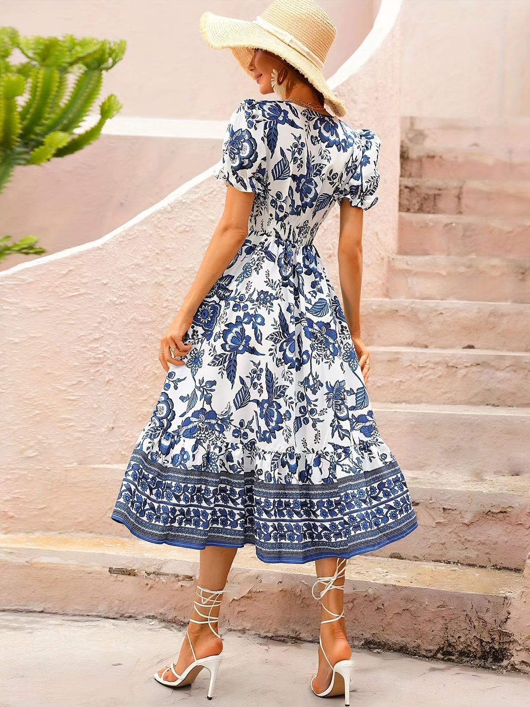 Elegant dress with wrap neckline and floral print