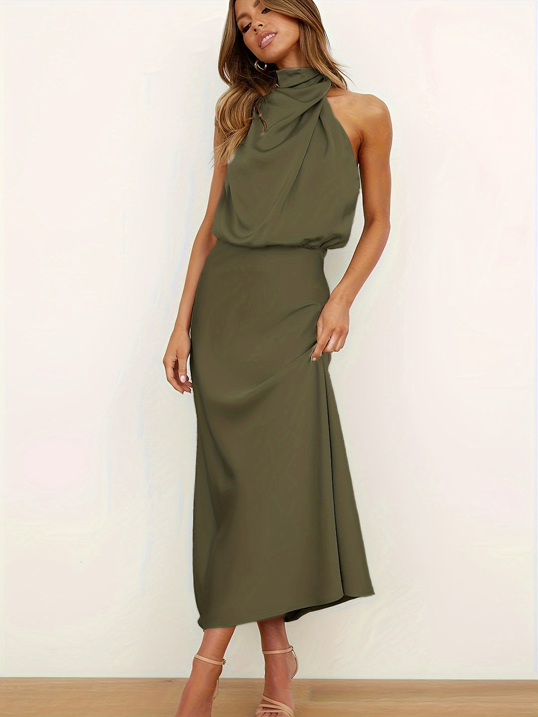 Elegant halter neck dress with cinch waist