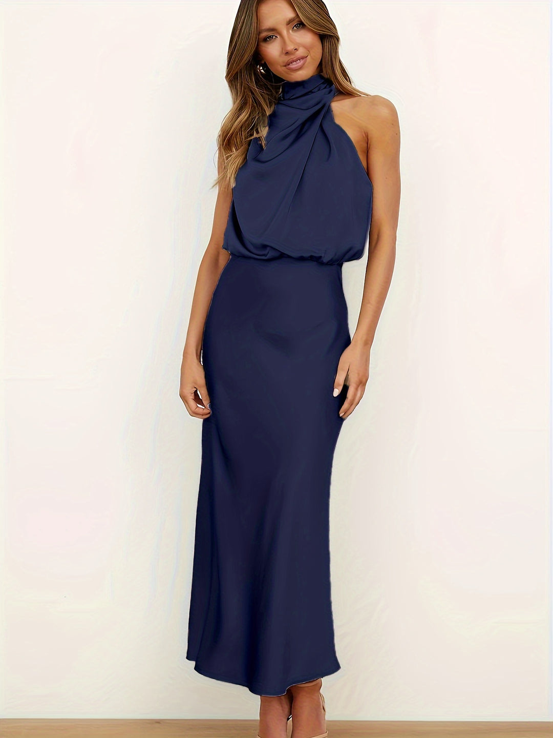 Elegant halter neck dress with cinch waist